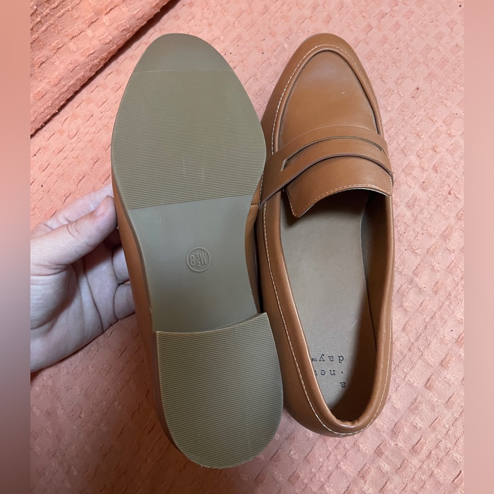 A new day, brown loafers, size women’s wide 8 1/2. Never worn!